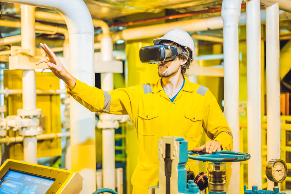 Human using VR headset in the manufacturing industry